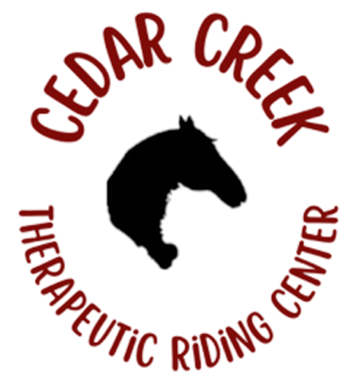 A logo featuring a black silhouette of a horse's head in the center of circular red text that reads, ‘Cedar Creek Therapeutic Riding Center’.